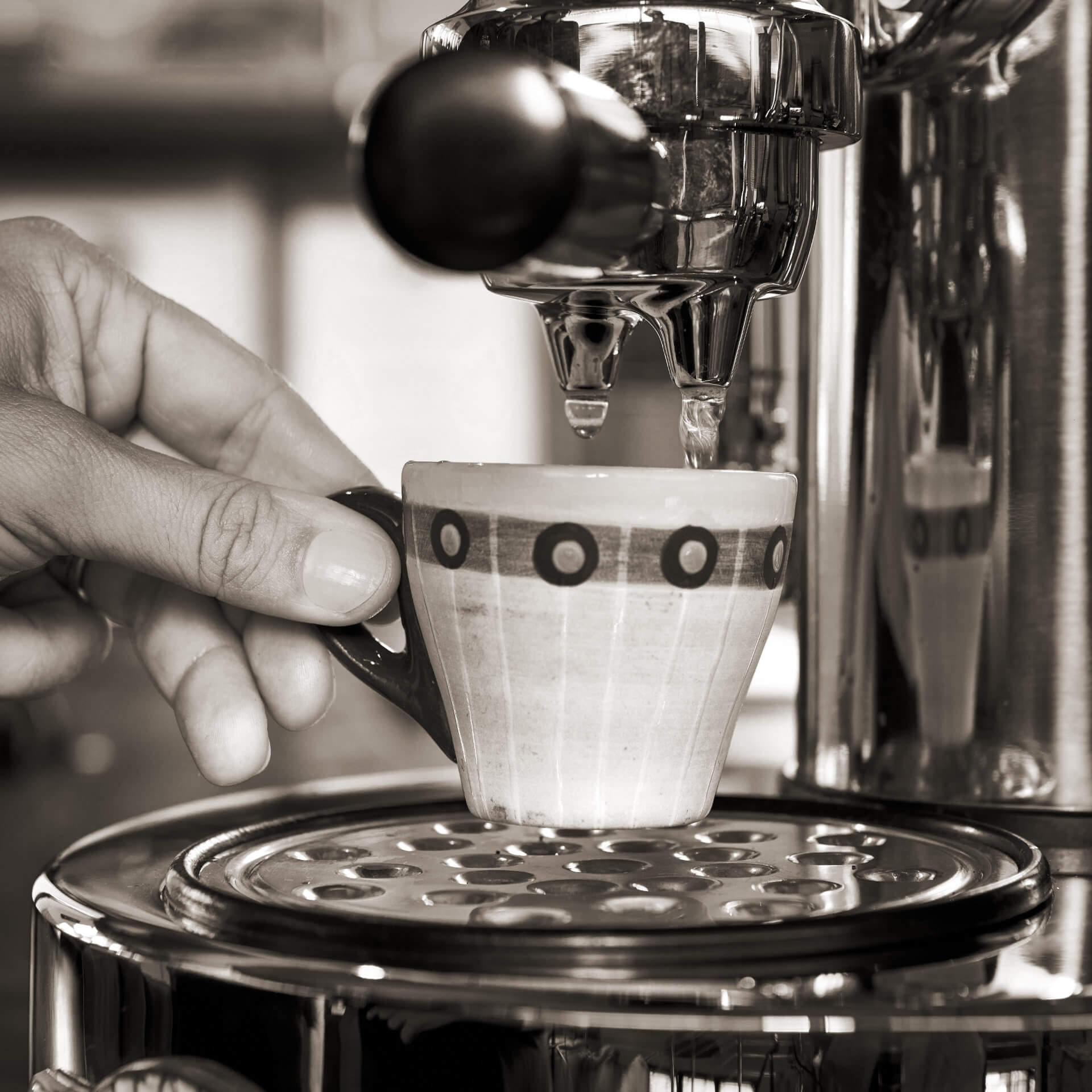 A bespoke espresso machine is brewing the perfect artisanal cup.